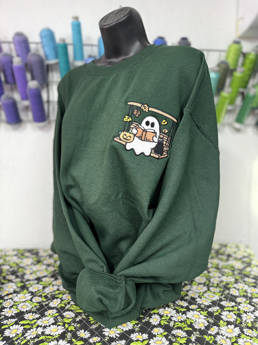 Ghost In Swing Reading On A Hunter Green Crewneck